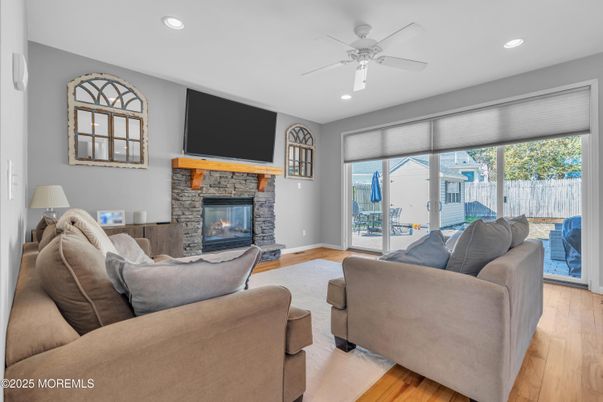 Fireplace, Interior, Living room, Recessed Lighting, Wood Texture Flooring