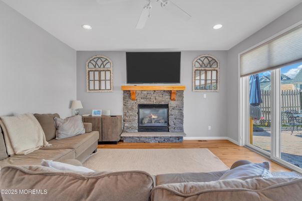 Fireplace, Interior, Living room, Recessed Lighting, Wood Texture Flooring