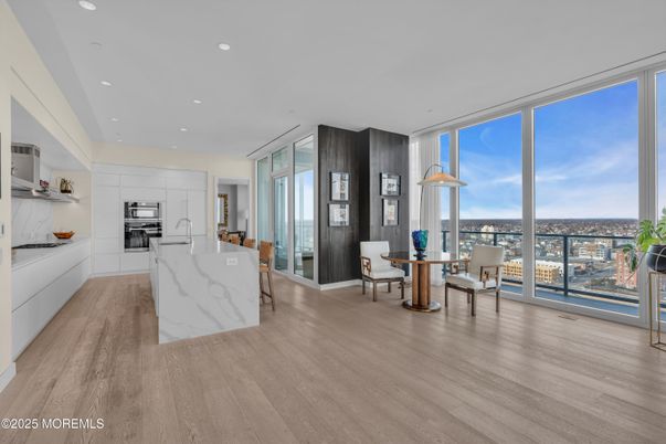 Dining room, Interior, Kitchen, Recessed Lighting, Stainless Steel Appliances, Wood Texture Flooring