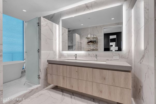 Bathroom, Dual Sink Vanities, Free Standing Baths, Interior, Marble, Marble Walls, Recessed Lighting