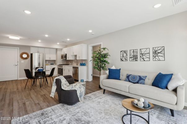 Dining room, Interior, Kitchen, Living room, Recessed Lighting, Stainless Steel Appliances, Wood Texture Flooring