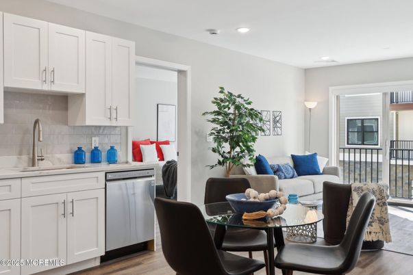 Dining room, Interior, Kitchen, Living room, Recessed Lighting, Stainless Steel Appliances, Wood Texture Flooring