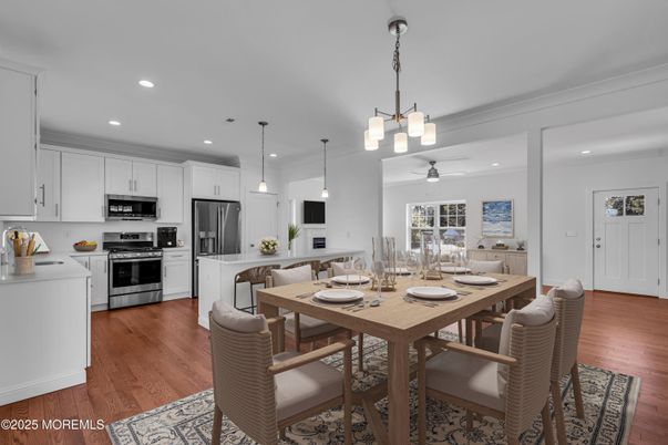 Dining room, Interior, Kitchen, Pendant Lights, Recessed Lighting, Stainless Steel Appliances, Wood Texture Flooring