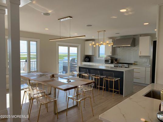 Dining room, Interior, Kitchen, Pendant Lights, Recessed Lighting, Stainless Steel Appliances, Wood Texture Flooring