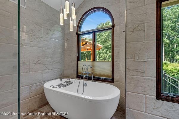 Bathroom, Free Standing Baths, Interior, Marble Walls, Pendant Lights