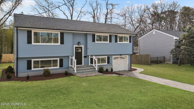 Attached, Exterior, Facade, Raised Ranch
