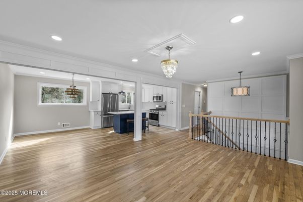 Chandelier, Interior, Kitchen, Pendant Lights, Recessed Lighting, Stainless Steel Appliances, Wood Texture Flooring