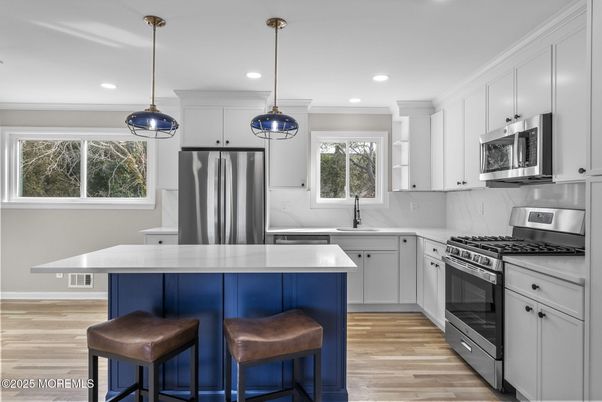 Interior, Kitchen, Pendant Lights, Recessed Lighting, Stainless Steel Appliances, Wood Texture Flooring