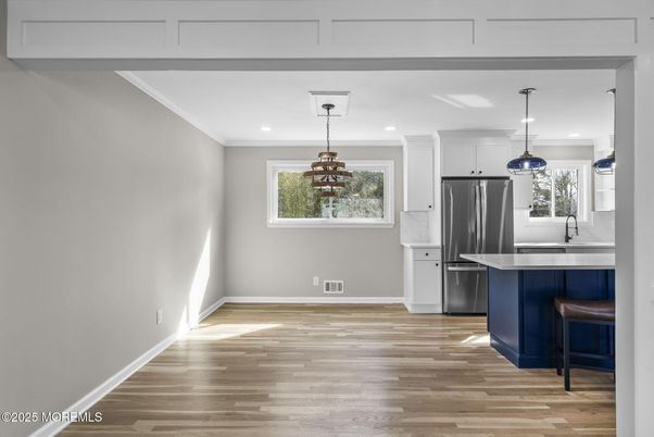 Interior, Kitchen, Pendant Lights, Recessed Lighting, Stainless Steel Appliances, Wood Texture Flooring