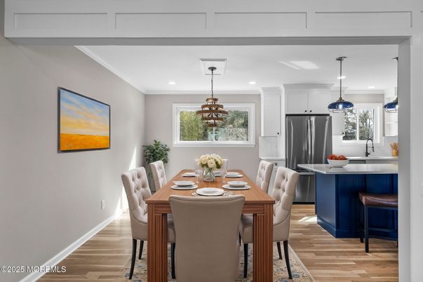 Dining room, Interior, Kitchen, Pendant Lights, Recessed Lighting, Stainless Steel Appliances, Wood Texture Flooring