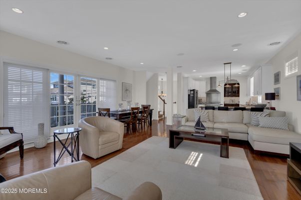 Dining room, Interior, Kitchen, Living room, Pendant Lights, Recessed Lighting, Stainless Steel Appliances, Wood Texture Flooring