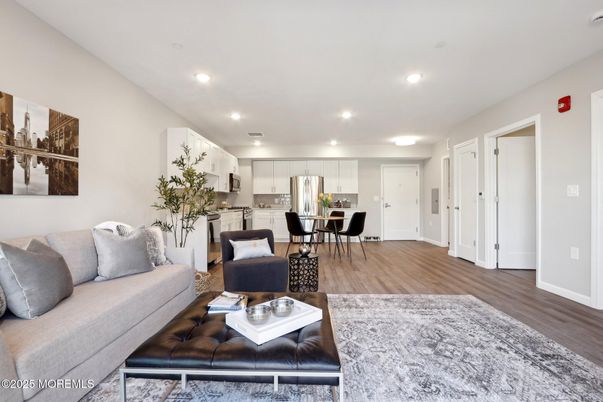 Dining room, Interior, Kitchen, Living room, Recessed Lighting, Stainless Steel Appliances, Wood Texture Flooring