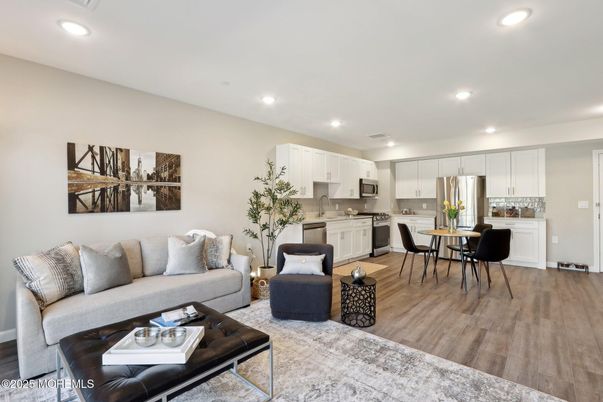 Dining room, Interior, Kitchen, Living room, Recessed Lighting, Stainless Steel Appliances, Wood Texture Flooring