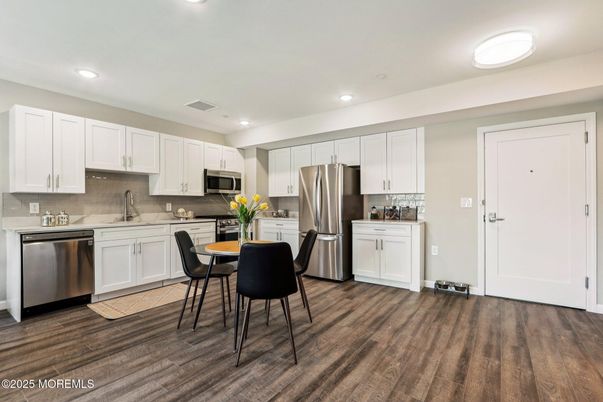 Dining room, Interior, Kitchen, Recessed Lighting, Stainless Steel Appliances, Wood Texture Flooring