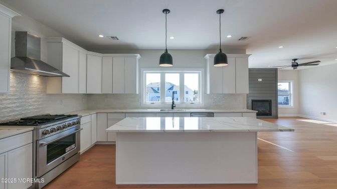 Interior, Kitchen, Pendant Lights, Recessed Lighting, Stainless Steel Appliances, Wood Texture Flooring
