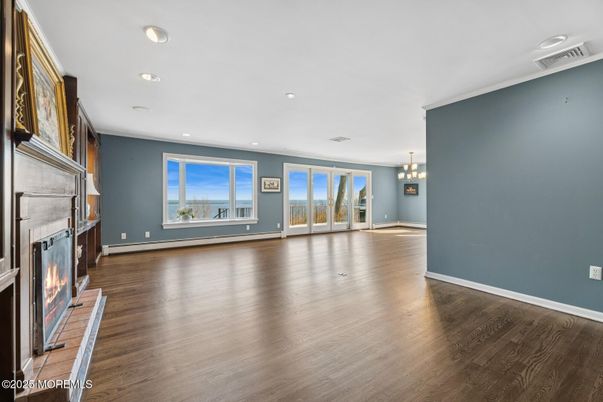 Chandelier, Empty room, Fireplace, Interior, Recessed Lighting, Wood Texture Flooring