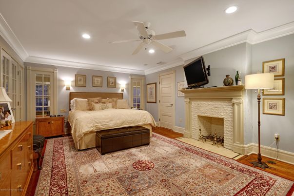 Bedroom, Fireplace, Interior, Recessed Lighting, Wood Texture Flooring