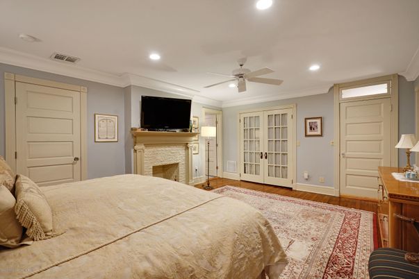 Bedroom, Fireplace, Interior, Recessed Lighting, Wood Texture Flooring