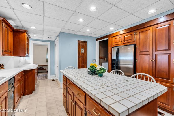 Interior, Kitchen, Recessed Lighting, Stainless Steel Appliances, Tile Countertops