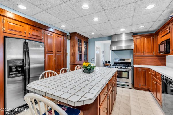 Interior, Kitchen, Recessed Lighting, Stainless Steel Appliances, Tile Countertops