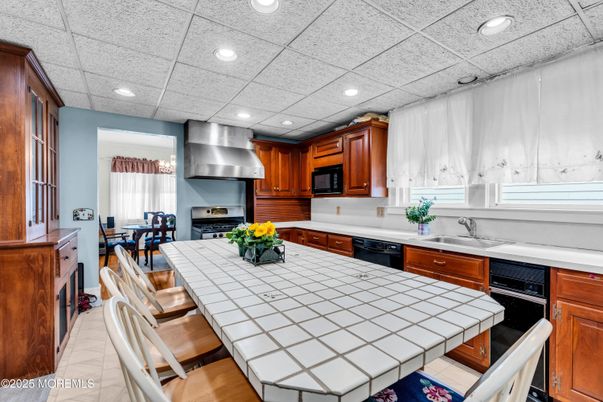 Dining room, Interior, Kitchen, Recessed Lighting, Stainless Steel Appliances, Tile Countertops