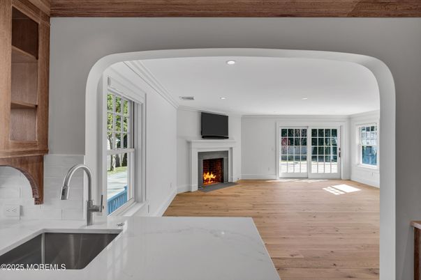 Fireplace, Interior, Kitchen, Recessed Lighting, Wood Texture Flooring