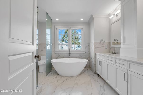 Bathroom, Dual Sink Vanities, Free Standing Baths, Interior, Marble, Marble Walls, Recessed Lighting