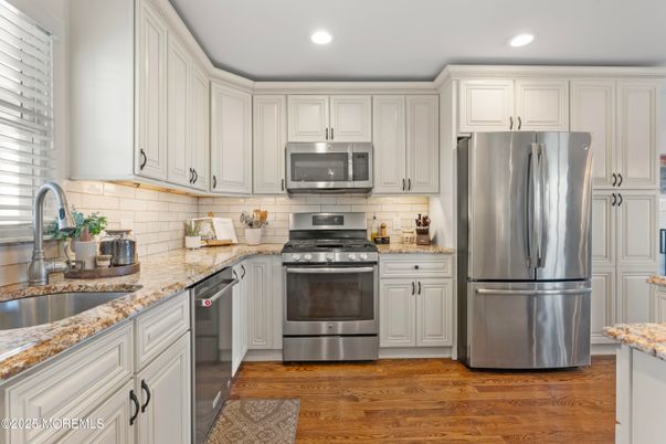 Interior, Kitchen, Recessed Lighting, Stainless Steel Appliances, Wood Texture Flooring