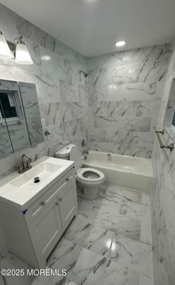 Bathroom, Dual Sink Vanities, Interior, Marble, Marble Walls, Recessed Lighting