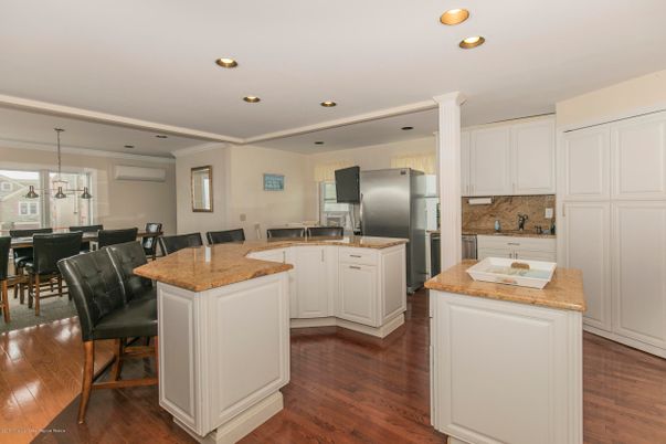 Dining room, Interior, Kitchen, Recessed Lighting, Stainless Steel Appliances, Wood Texture Flooring