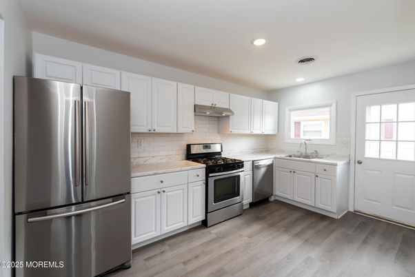 Interior, Kitchen, Recessed Lighting, Stainless Steel Appliances, Wood Texture Flooring