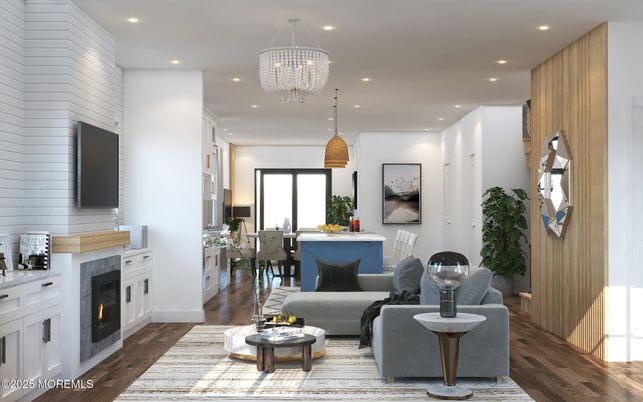 Chandelier, Dining room, Fireplace, Interior, Living room, Pendant Lights, Recessed Lighting, Wood Texture Flooring