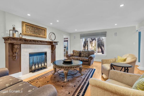 Fireplace, Interior, Living room, Recessed Lighting, Wood Texture Flooring