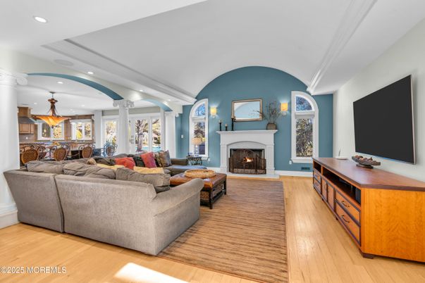 Dining room, Fireplace, Interior, Living room, Pendant Lights, Recessed Lighting, Wood Texture Flooring