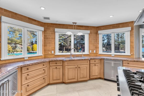 Interior, Kitchen, Pendant Lights, Recessed Lighting, Stainless Steel Appliances, Stone Walls