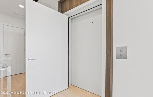 Elevator, Interior, Recessed Lighting, Wood Texture Flooring