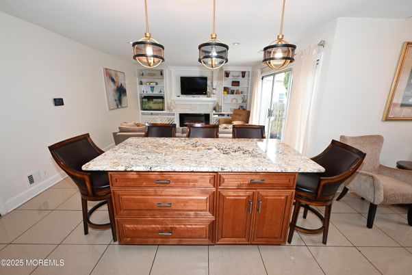 Dining room, Fireplace, Interior, Living room, Pendant Lights