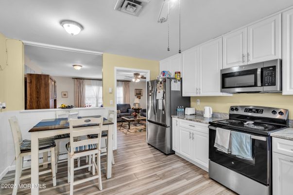 Dining room, Interior, Kitchen, Living room, Pendant Lights, Stainless Steel Appliances, Wood Texture Flooring