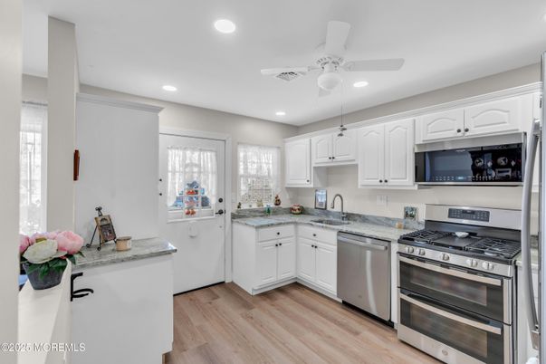Interior, Kitchen, Recessed Lighting, Stainless Steel Appliances, Wood Texture Flooring
