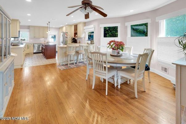 Dining room, Interior, Kitchen, Recessed Lighting, Stainless Steel Appliances, Wood Texture Flooring