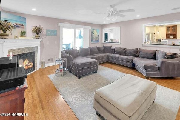 Fireplace, Interior, Living room, Recessed Lighting, Wood Texture Flooring
