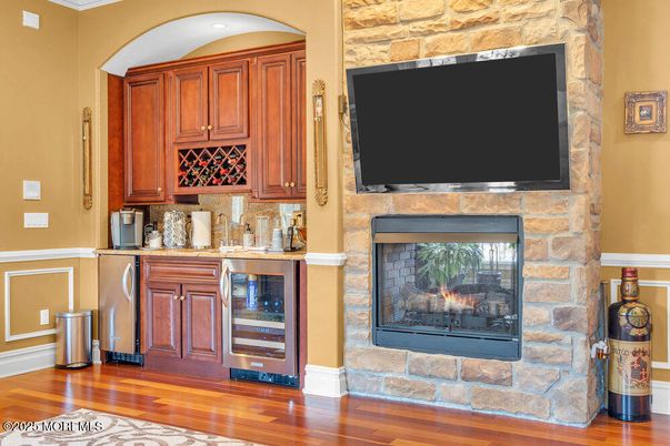 Fireplace, Interior, Kitchen, Recessed Lighting, Stone Walls, Wood Texture Flooring