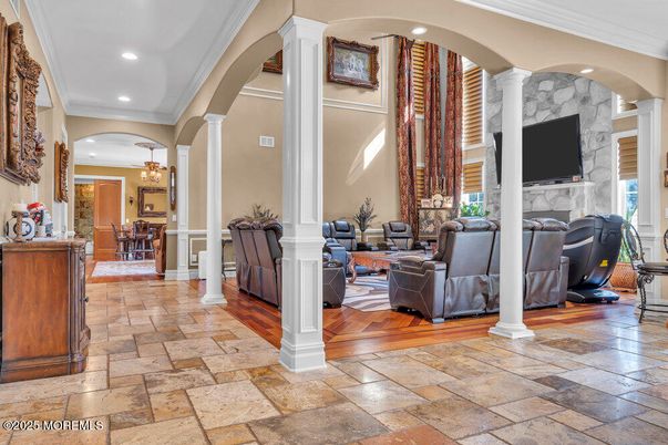 Chandelier, Dining room, Fireplace, Interior, Living room, Recessed Lighting, Wood Texture Flooring