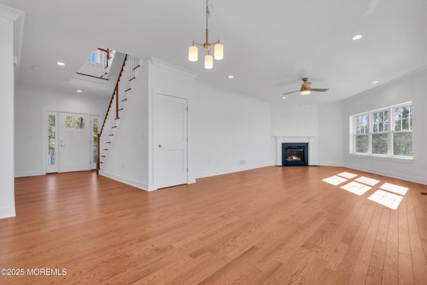 Empty room, Fireplace, Interior, Pendant Lights, Recessed Lighting, Wood Texture Flooring