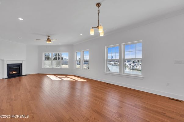 Empty room, Fireplace, Interior, Pendant Lights, Recessed Lighting, Wood Texture Flooring