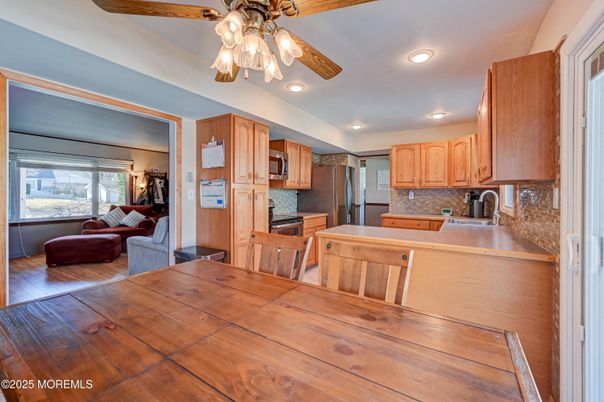 Dining room, Interior, Kitchen, Living room, Recessed Lighting, Wood Texture Flooring