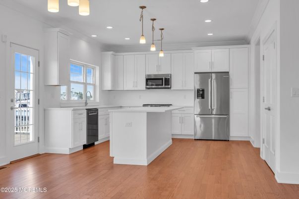 Interior, Kitchen, Pendant Lights, Recessed Lighting, Stainless Steel Appliances, Wood Texture Flooring