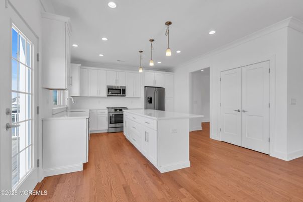 Interior, Kitchen, Pendant Lights, Recessed Lighting, Stainless Steel Appliances, Wood Texture Flooring