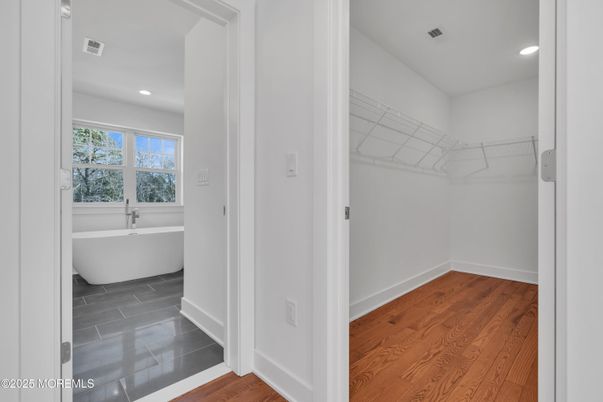 Bathroom, Free Standing Baths, Interior, Recessed Lighting, Walk-in Closets, Wood Texture Flooring