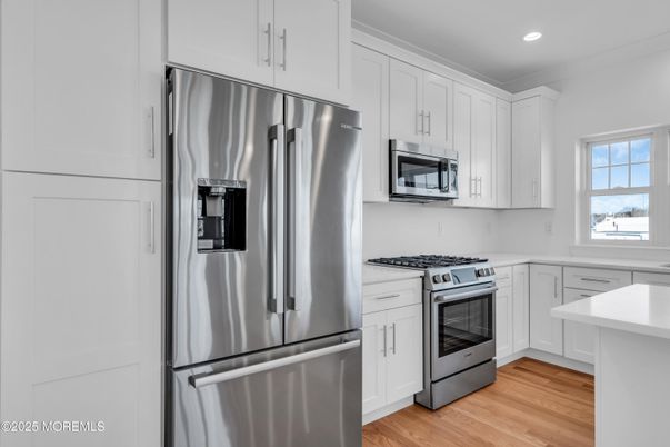 Interior, Kitchen, Recessed Lighting, Stainless Steel Appliances, Wood Texture Flooring